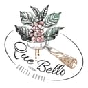 Que Bello logo